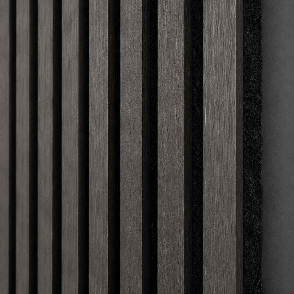 Close-up of charcoal acoustic wood slat wall panel texture